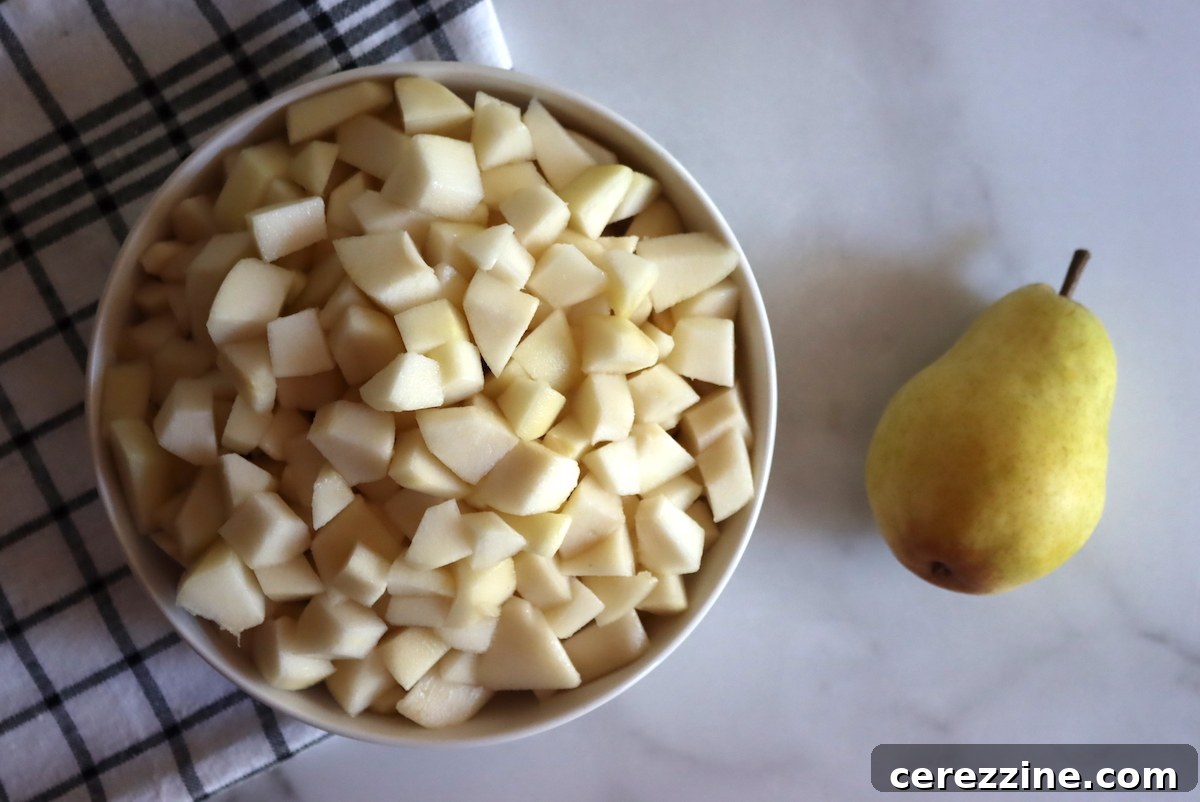 A basket of fresh pears, ready for making homemade pear sauce.