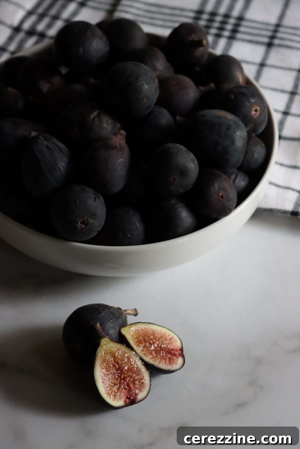 Close-up of fresh Black Mission figs, showcasing their dark, rich color and potential for a beautiful fig jam.