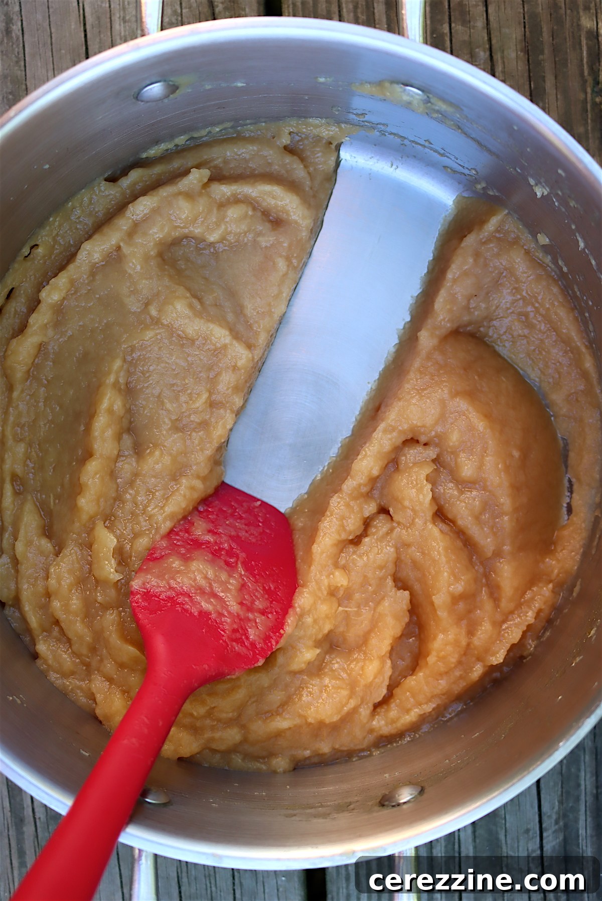 Homemade Fruit Butters: Apple, Pear, Peach and Beyond 7 Pear Butter passing the trace test, indicating perfect thickness.