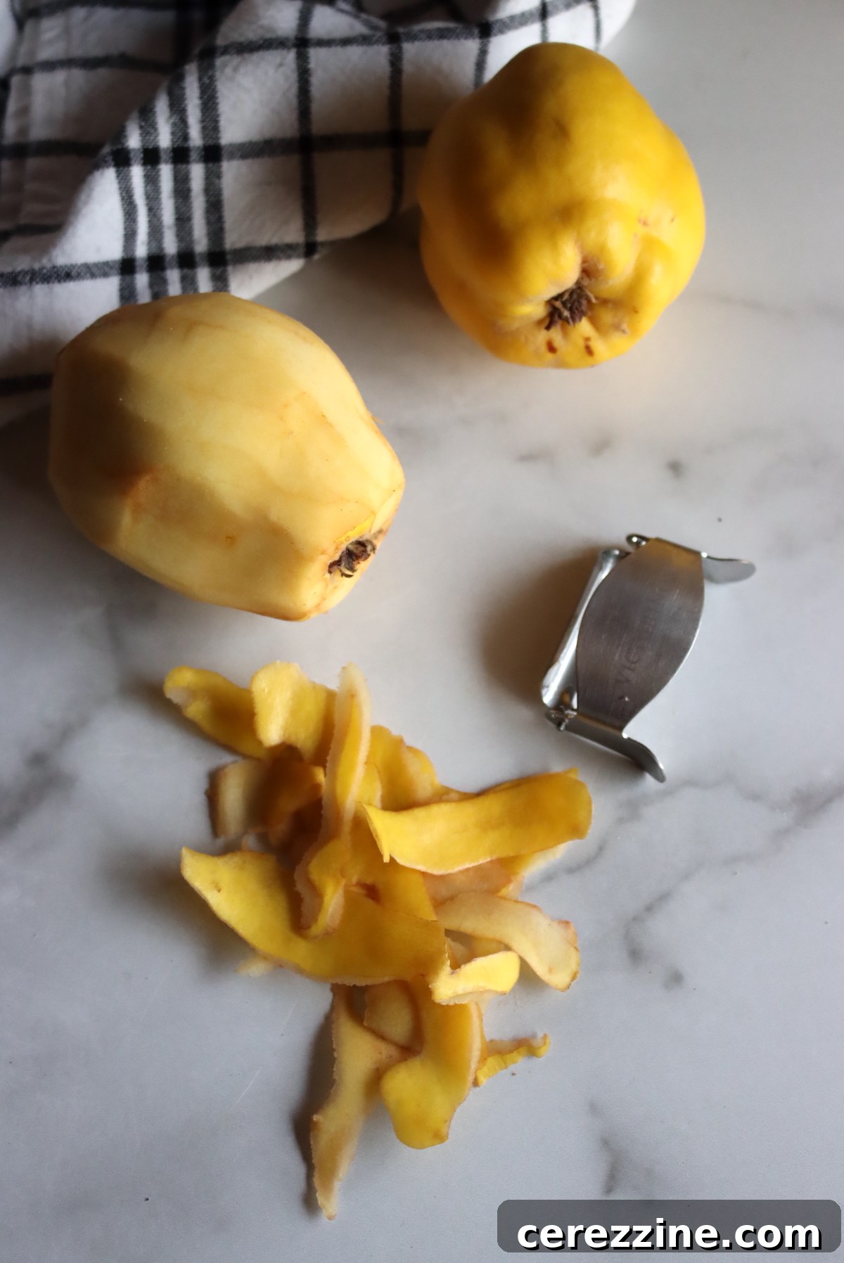 Peeling quince with a sharp peeler