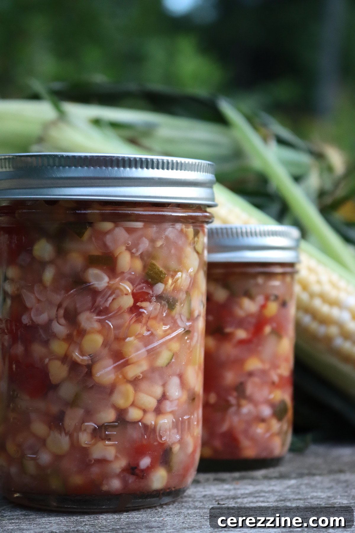 Preserve Summer: Homemade Corn Relish for Your Pantry 3 Close-up of vibrant corn relish in a glass bowl.
