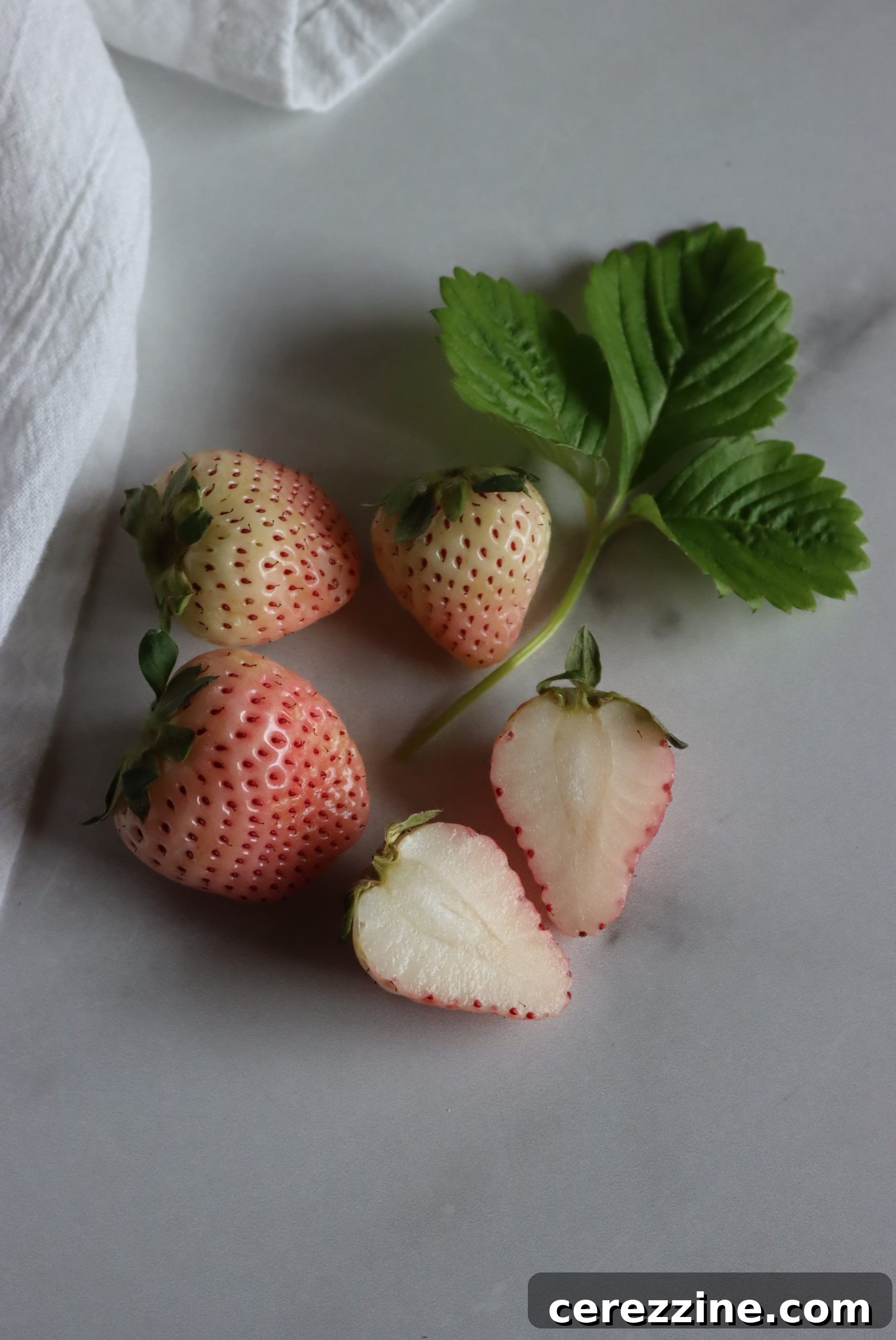 Sliced Pineberries for jam