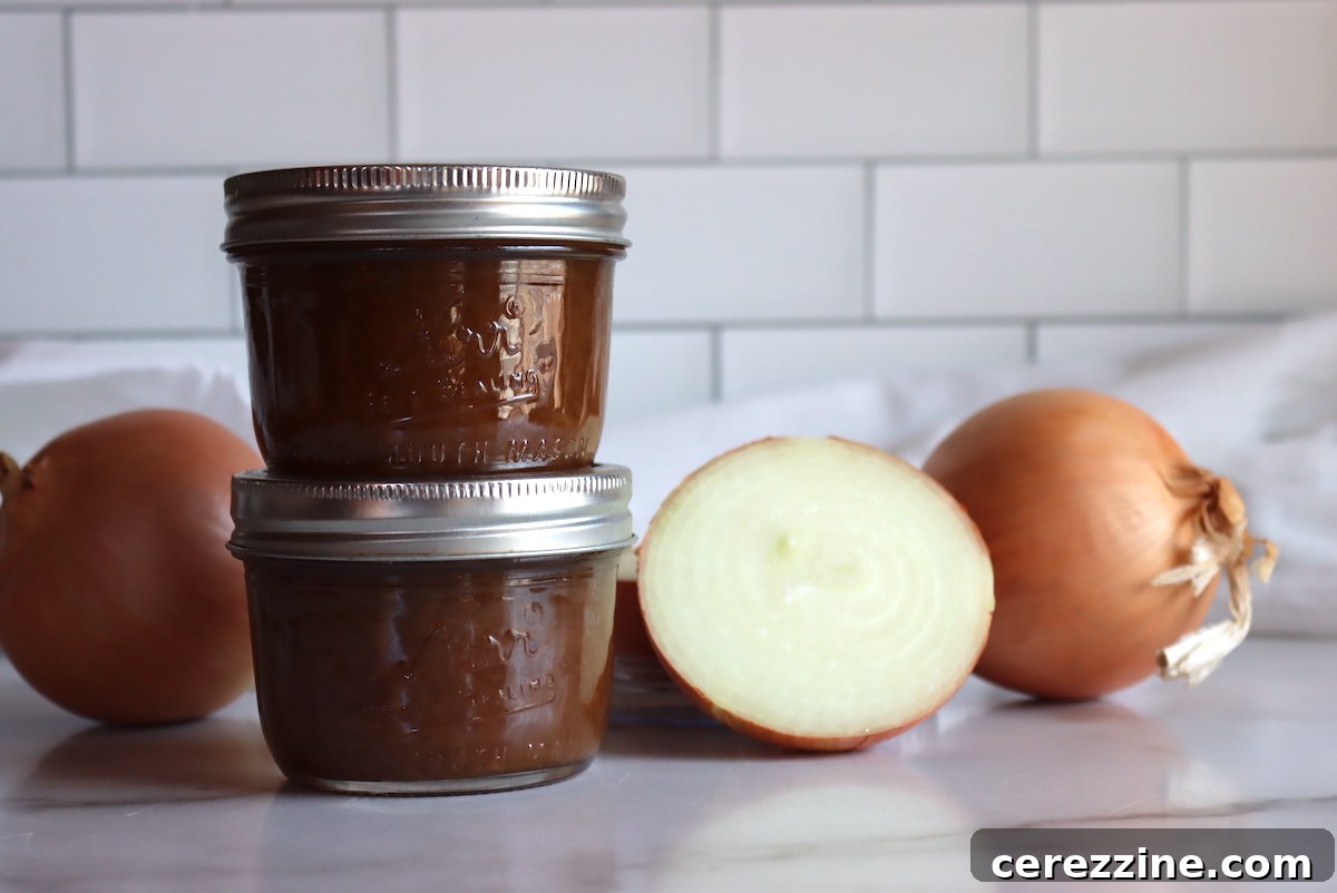 Jars of Caramelized Onion Jam cooling after canning