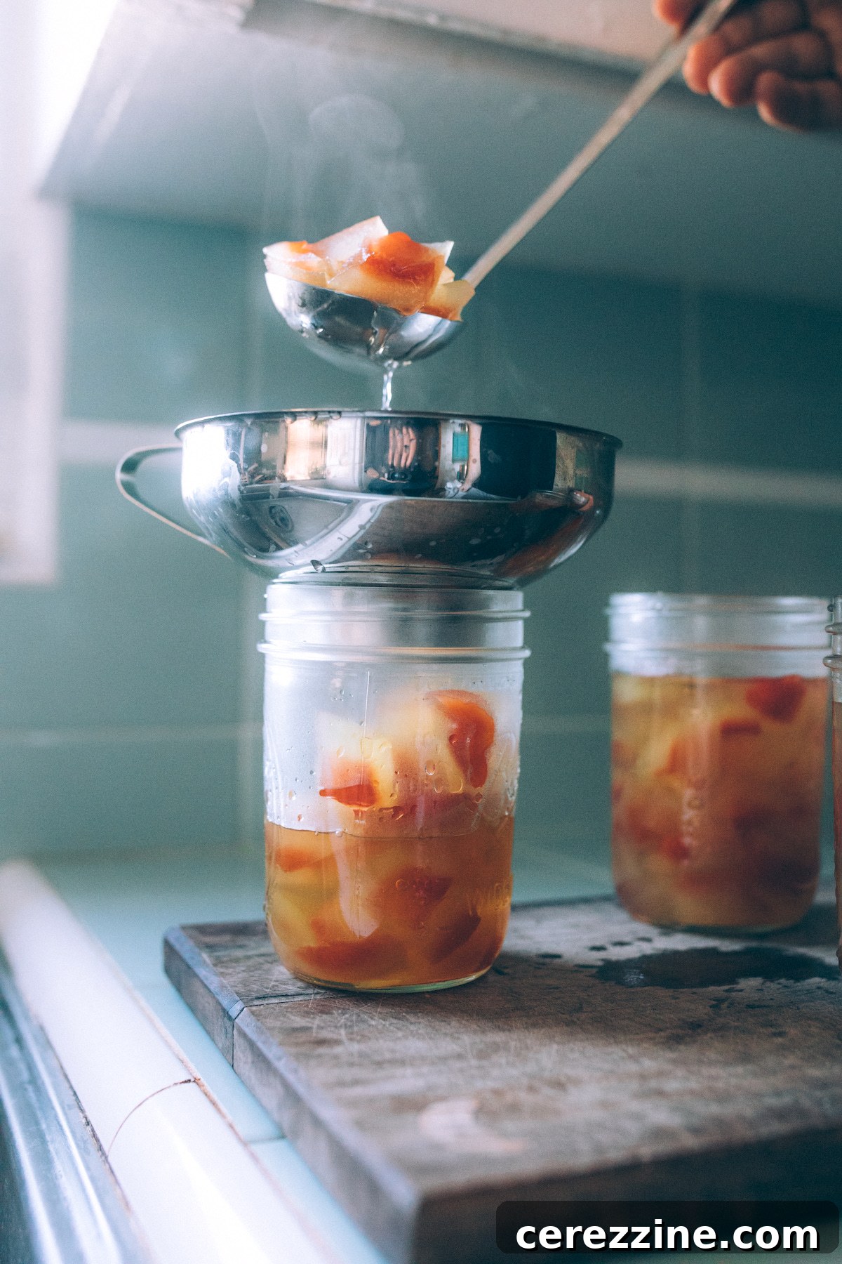 Filling Jars with Watermelon Rind Pickles