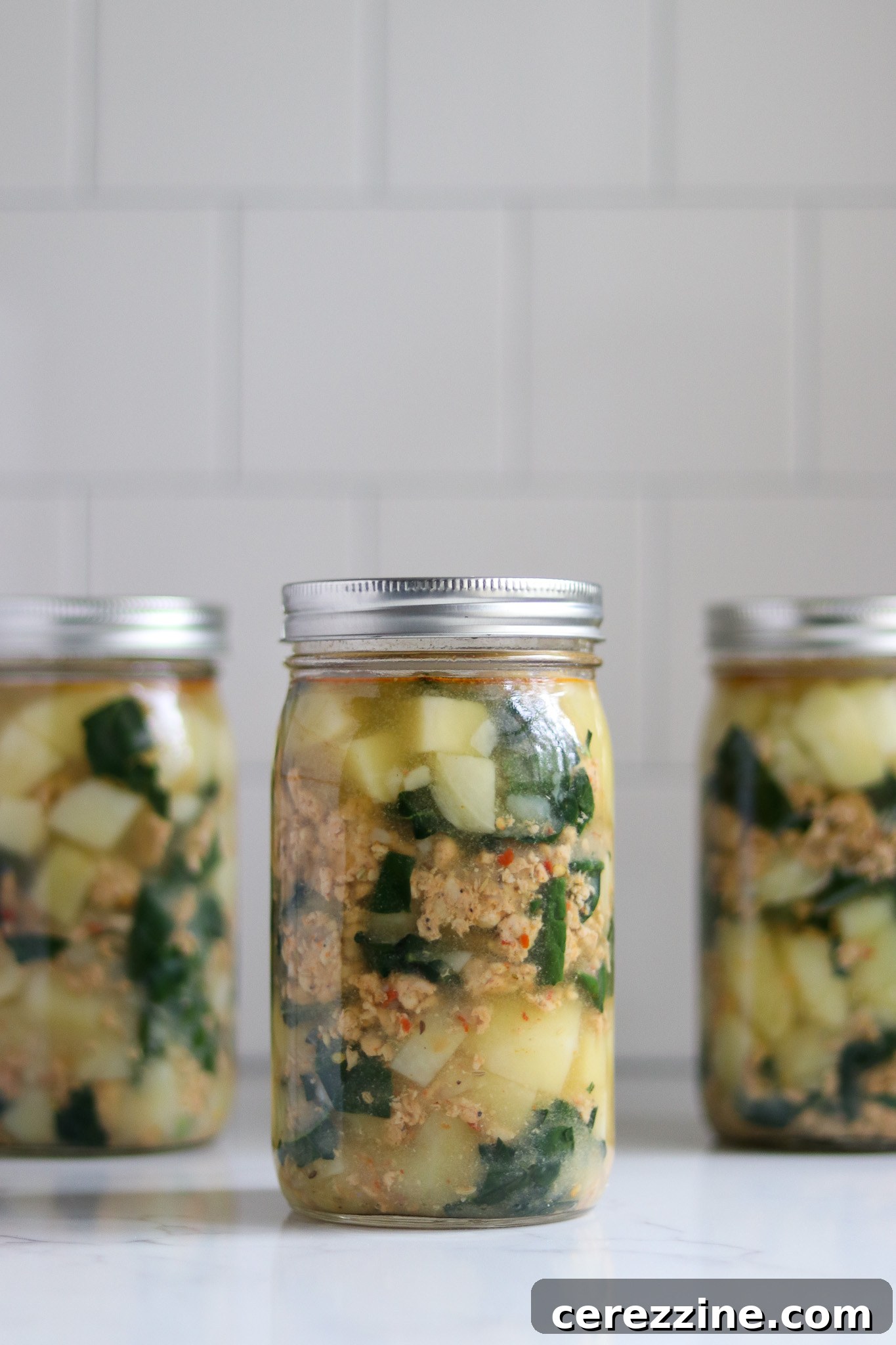 Canned soup jars neatly stacked