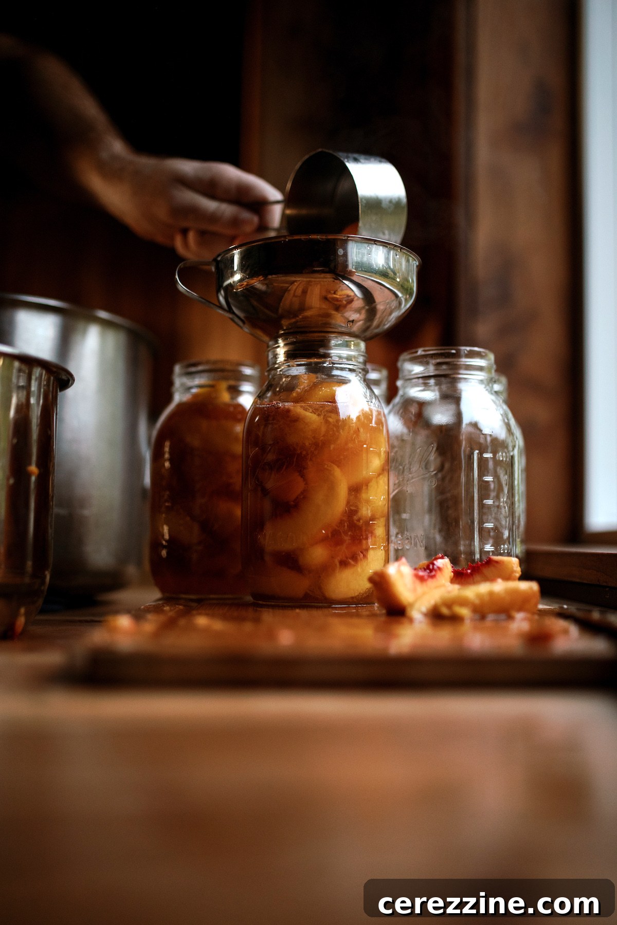 Putting Up Peaches 19 Adding Syrup to Home Canned Peaches