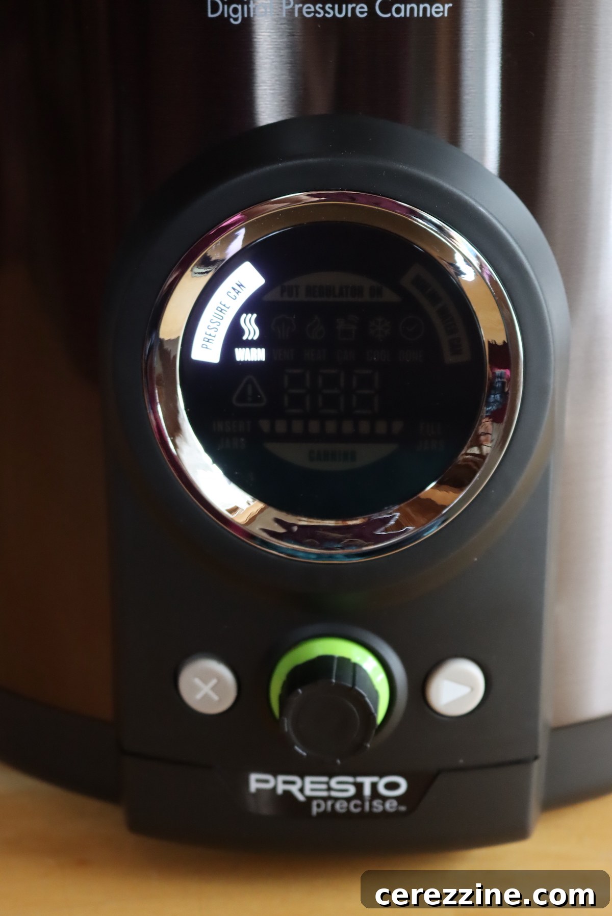 Digital Pressure Canner display showing 'Warming' during the pre-heat cycle.