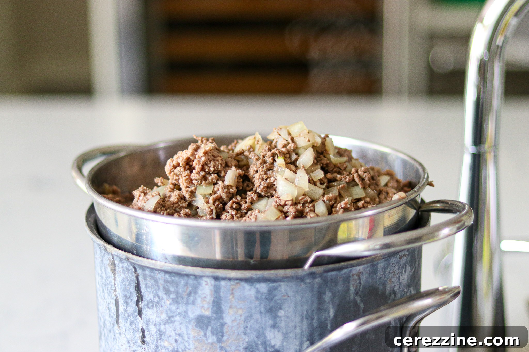 A Bounty of Canned Ground Beef Recipes 5 Draining Excess Fat from Ground Meat for Canning Sloppy Joes