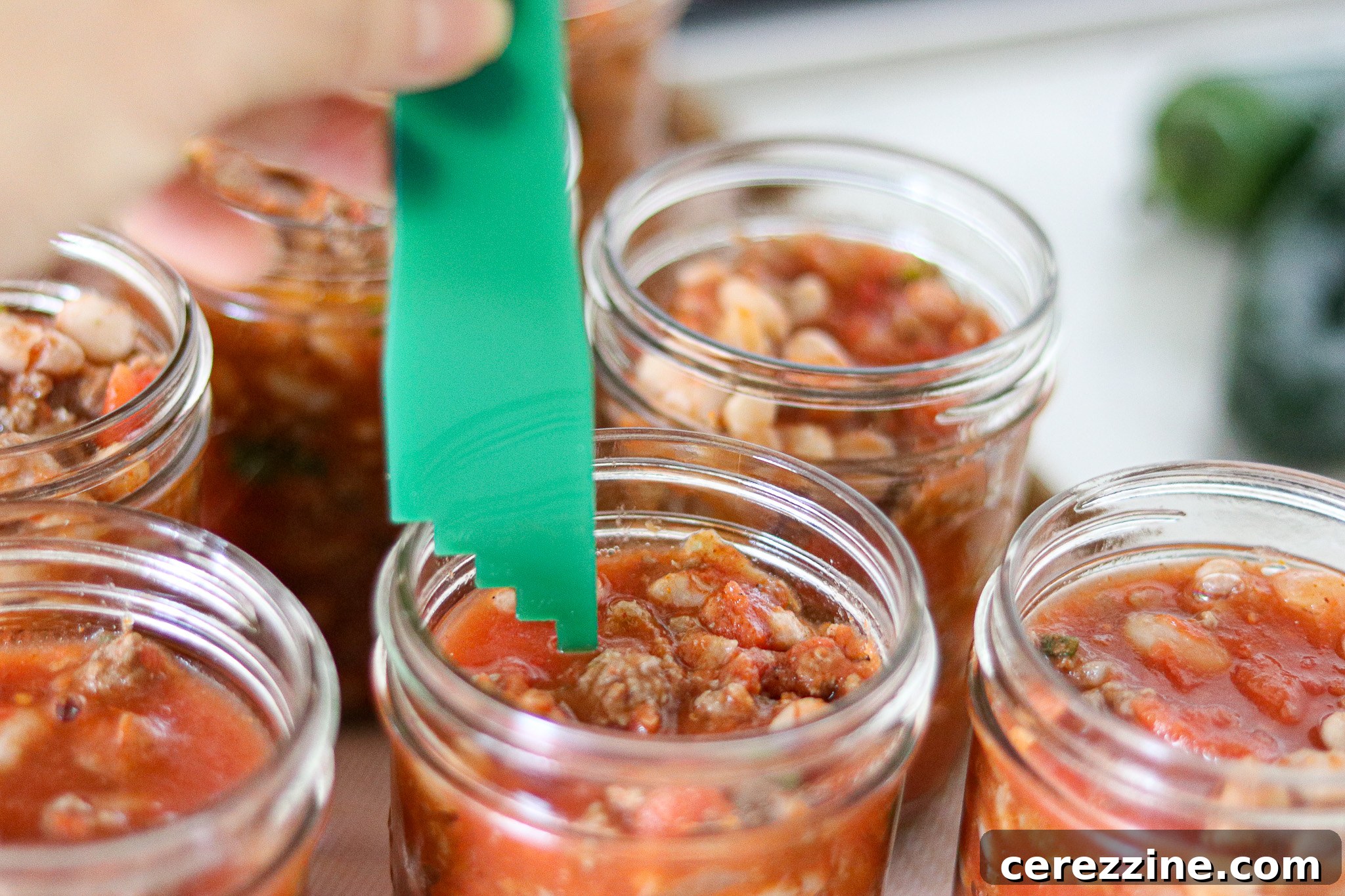 A Bounty of Canned Ground Beef Recipes 6 Ensuring Proper Headspace for Canning Chili with Ground Beef