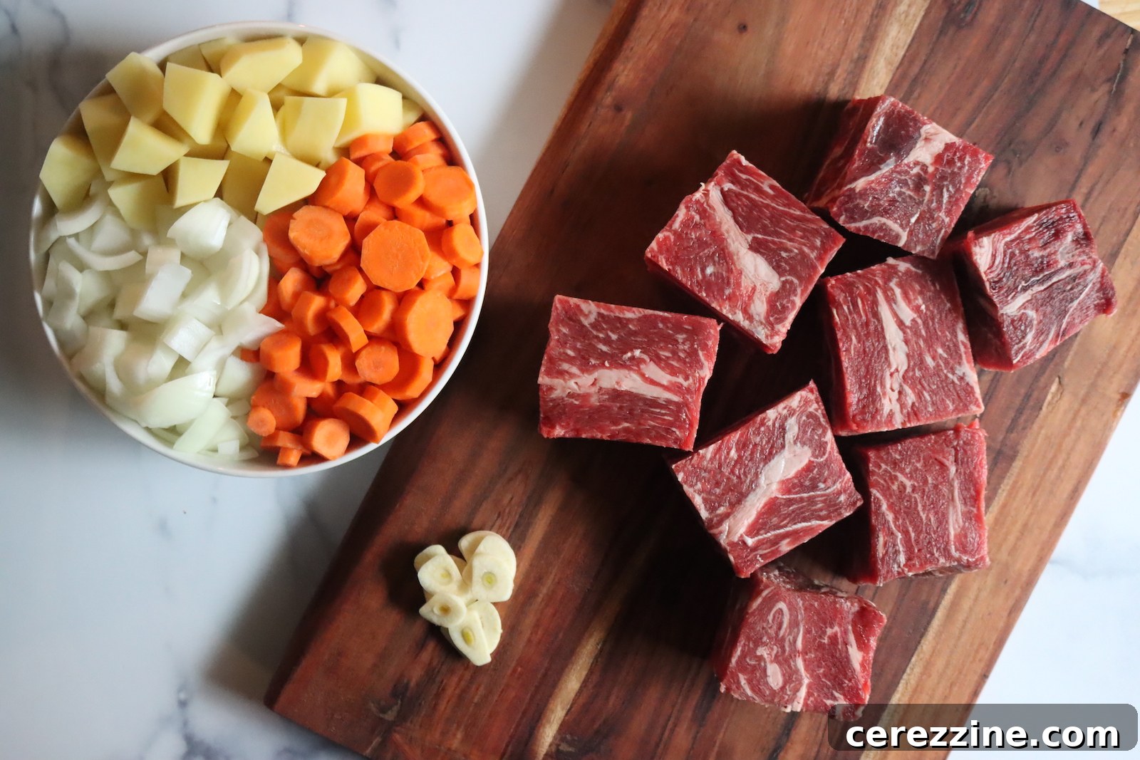 Pot Roast in Jars: A Canning Guide 3 Fresh ingredients laid out for canning pot roast in a jar, including beef, vegetables, and seasonings