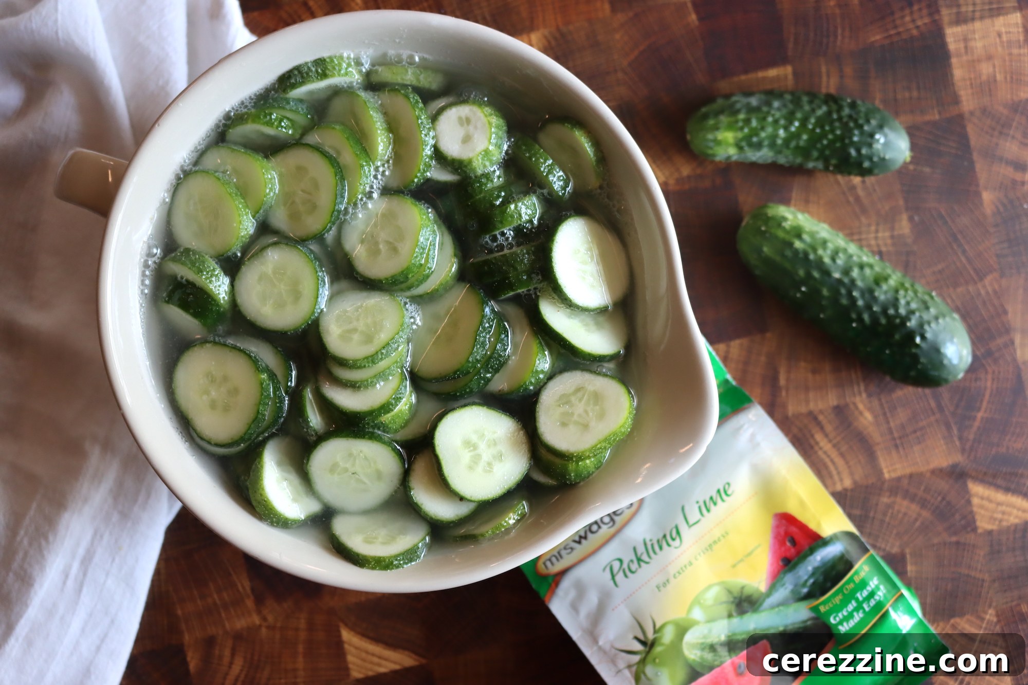 Old Fashioned Super Crispy Cucumber Pickles 3 Lime Pickle Cucumber - A rustic image of jars filled with crisp lime pickles, ready for storage.