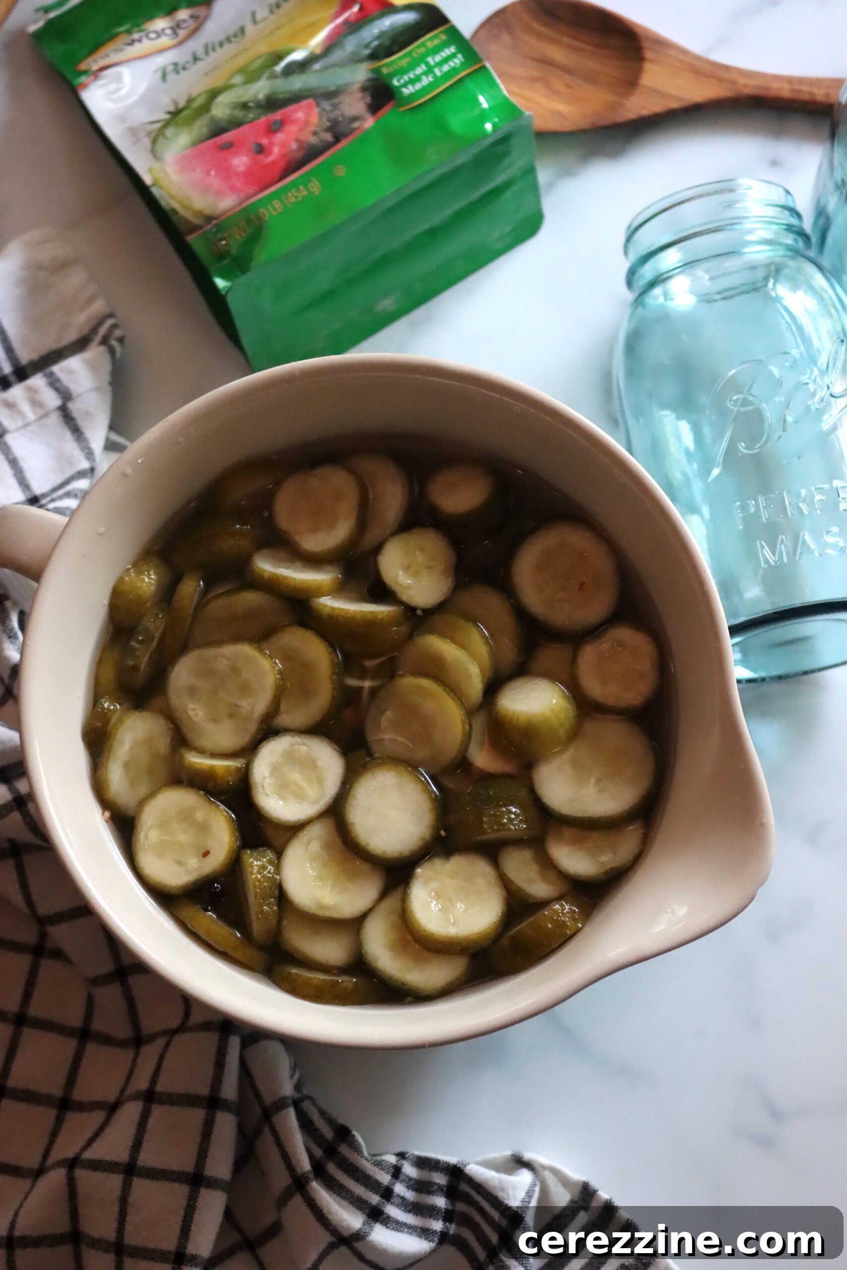 Old Fashioned Super Crispy Cucumber Pickles 6 Lime Pickle Cucumber - A jar of freshly canned lime pickles, showing the clear brine and firm cucumber slices.