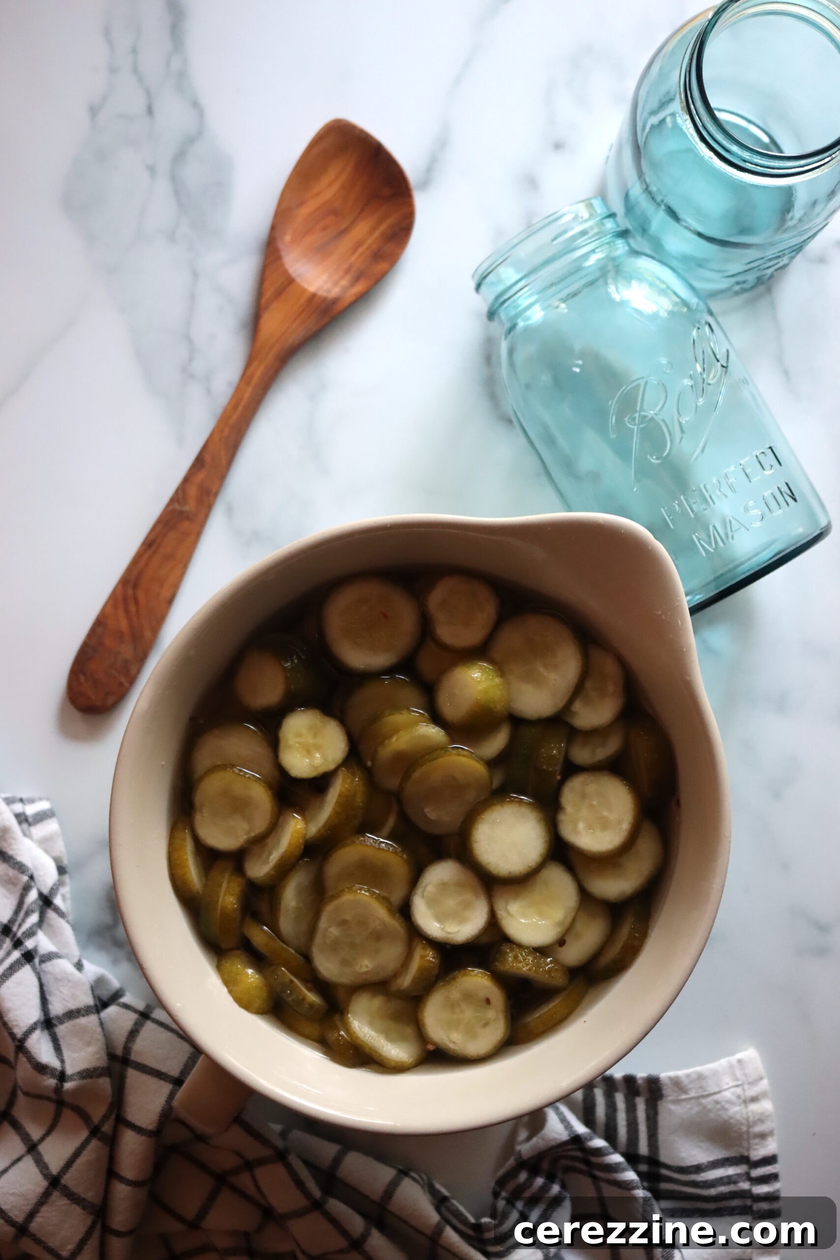 Old Fashioned Super Crispy Cucumber Pickles 7 Lime Pickle Cucumber - A neatly organized pantry shelf with several jars of homemade lime pickles.