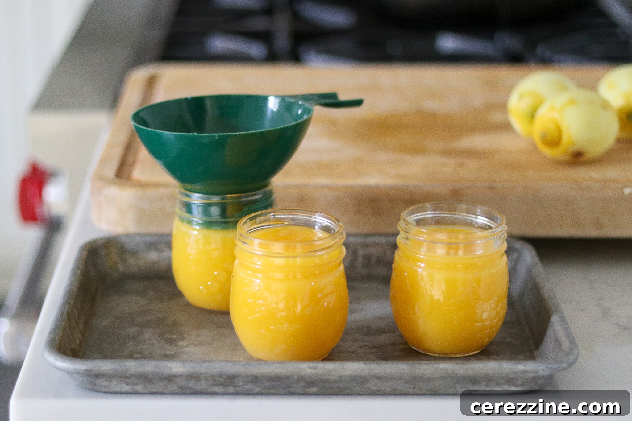 Preserving Liquid Sunshine 19 Filling Jars with Lemon Curd