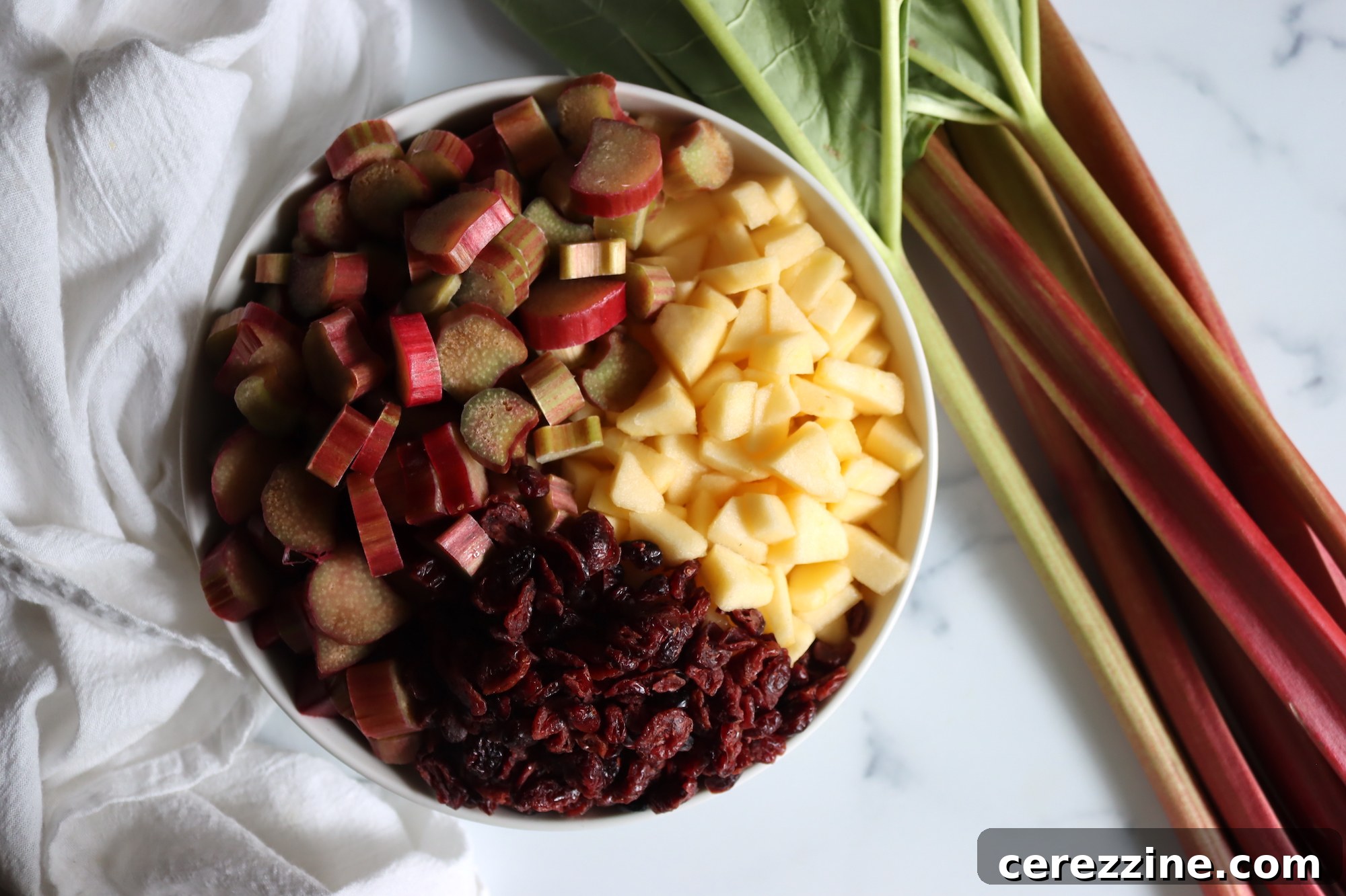 Zesty Rhubarb Chutney 4 Rhubarb Chutney Ingredients laid out on a cutting board
