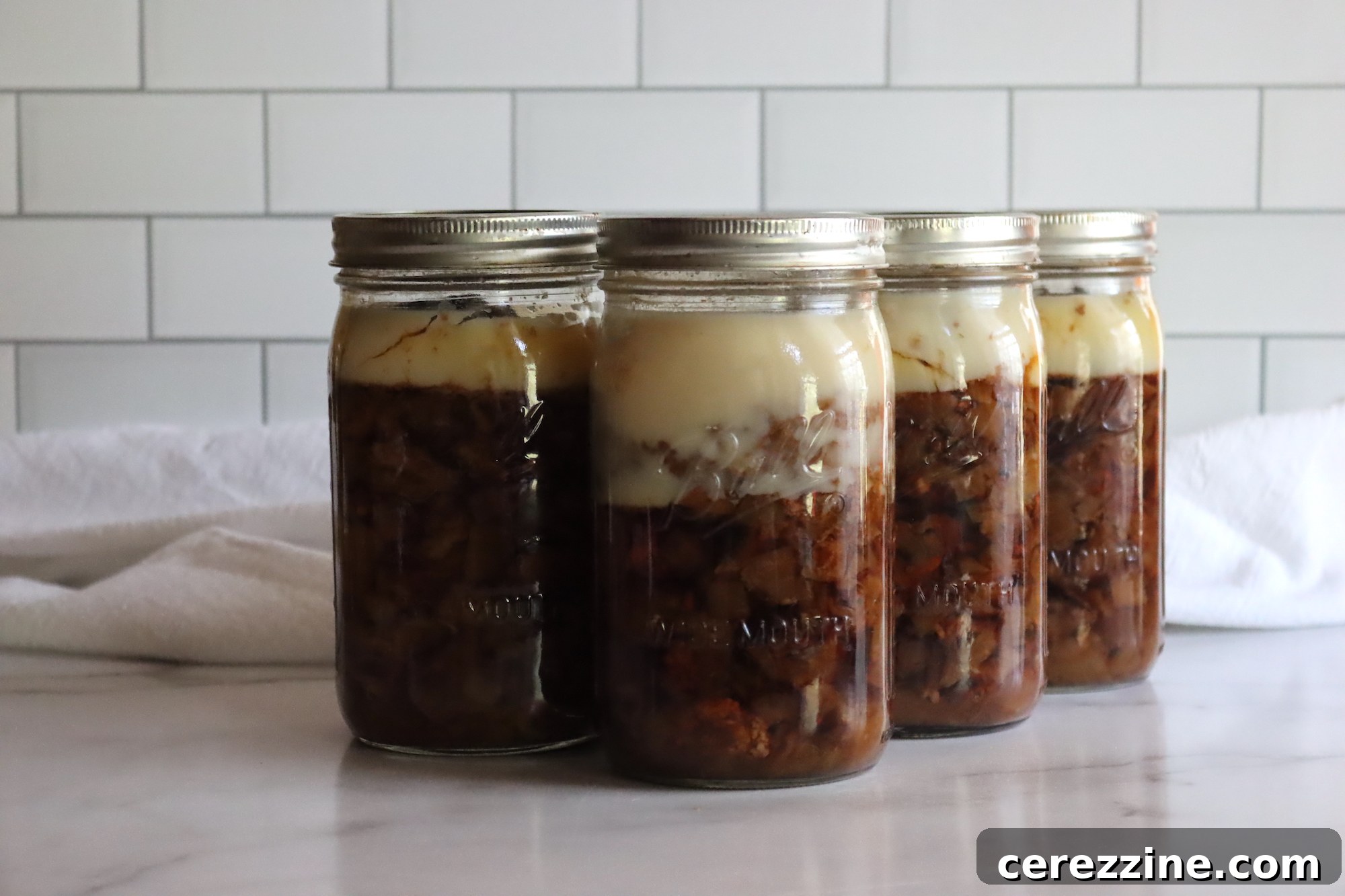 Canning Lamb pieces in jars, ready for processing