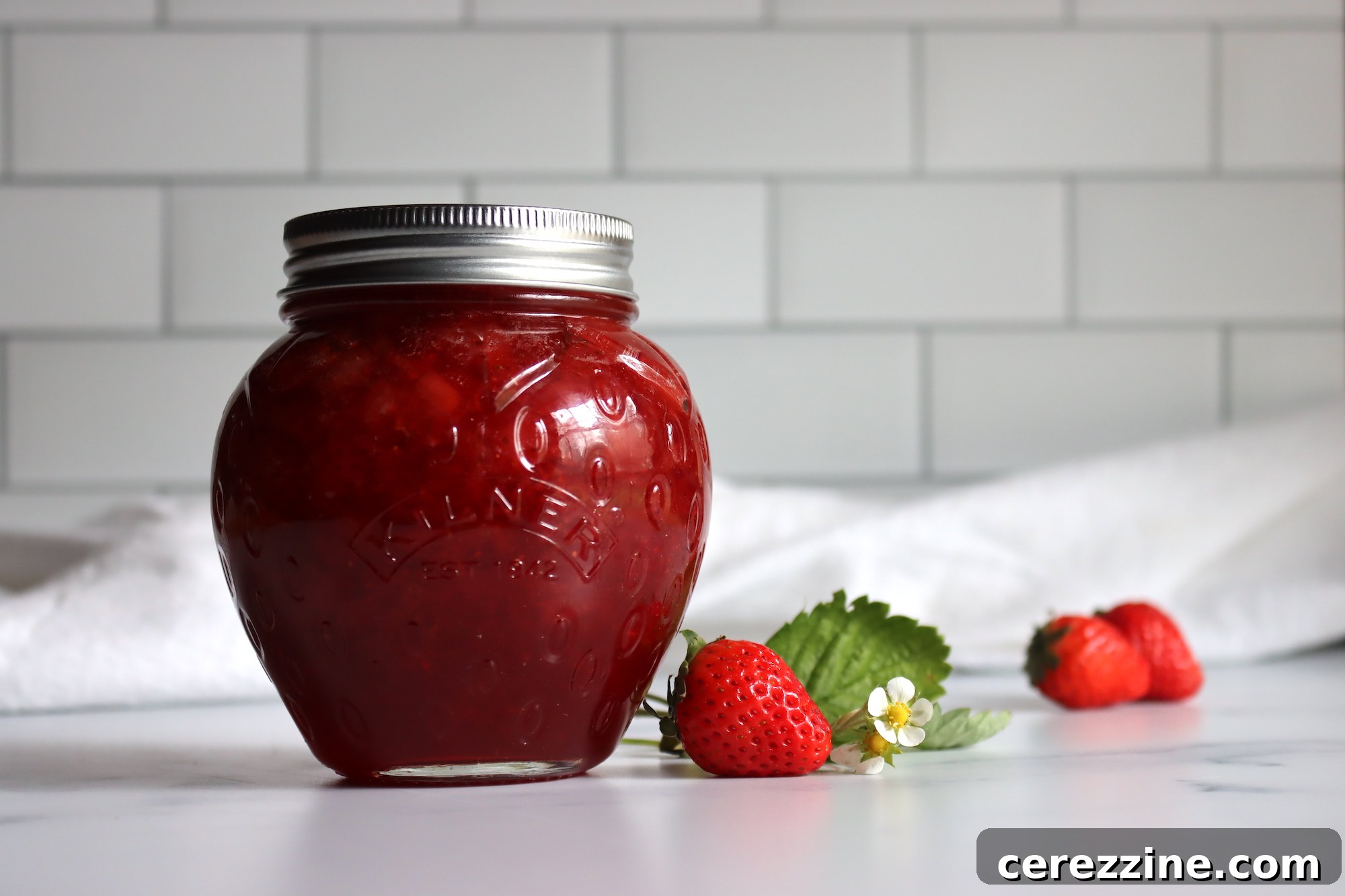 Strawberry Jam Cooking in a Pot on the Stove