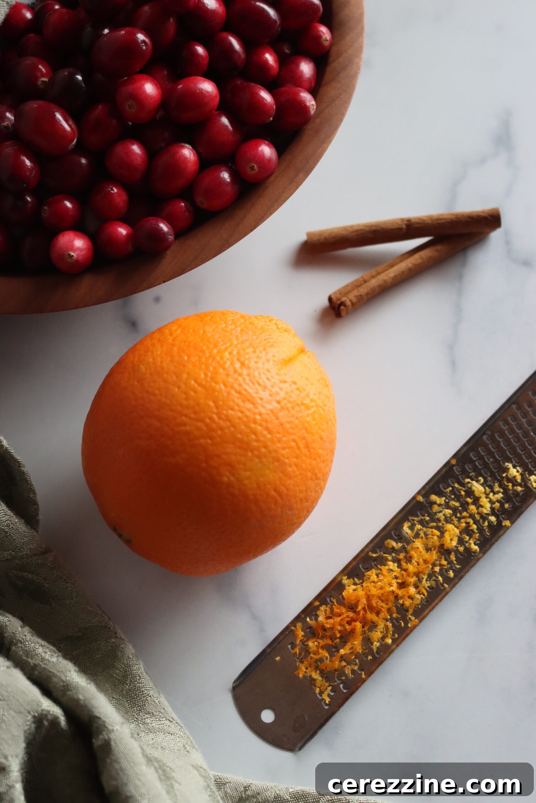 Citrus Burst Cranberry Sauce 4 Ingredients for Cranberry Orange Sauce laid out on a table