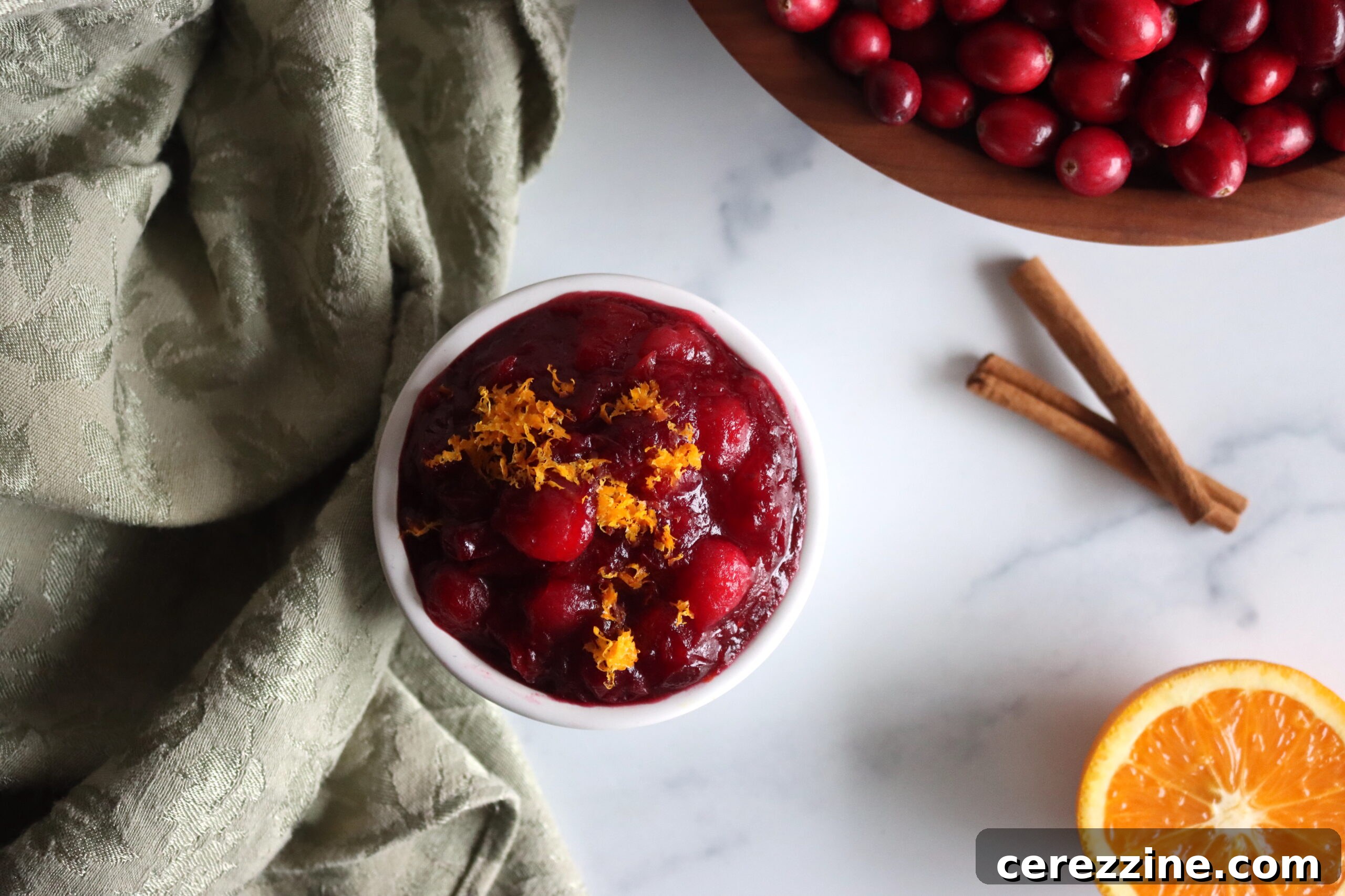 Citrus Burst Cranberry Sauce 5 Jars of homemade Cranberry Orange Sauce being sealed