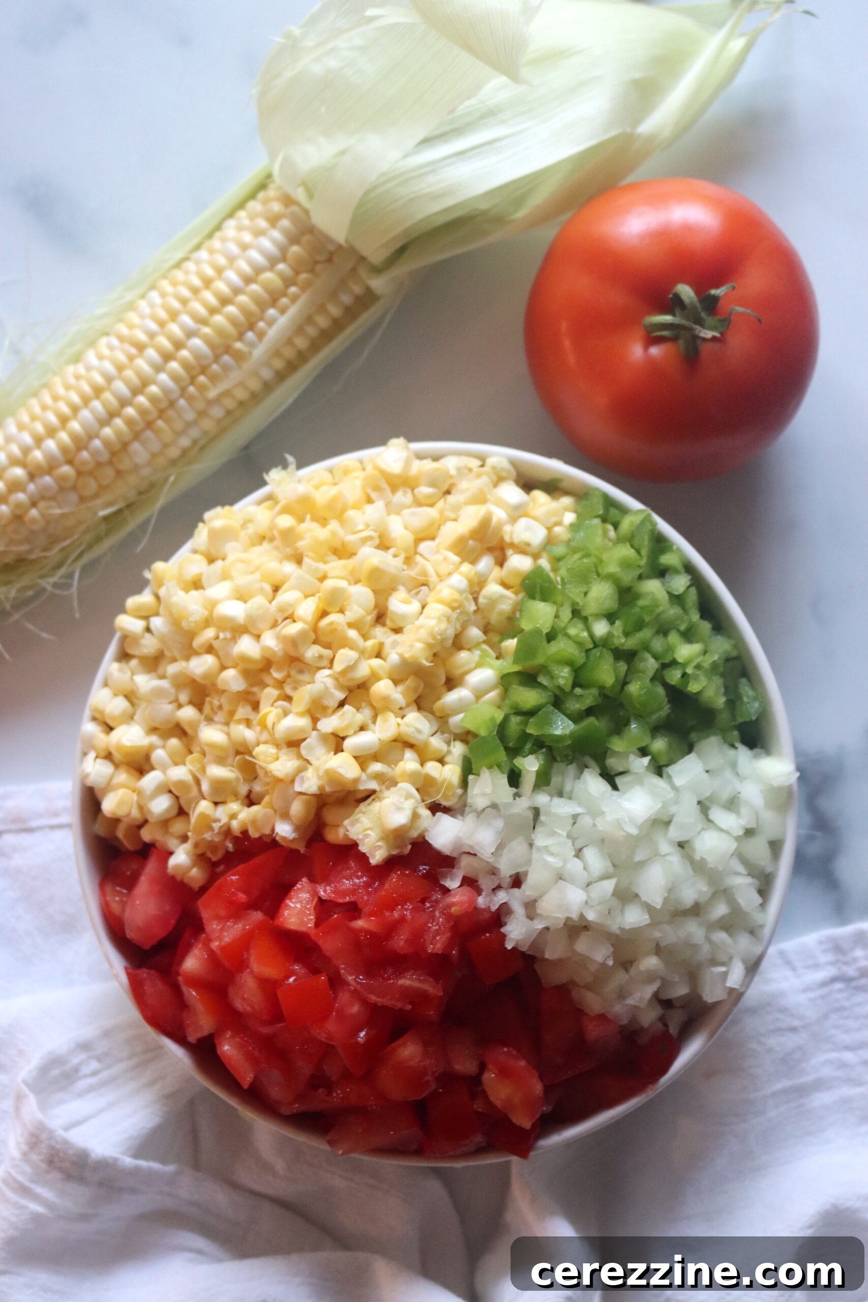 Fresh ingredients laid out for making Southwestern Corn Salsa