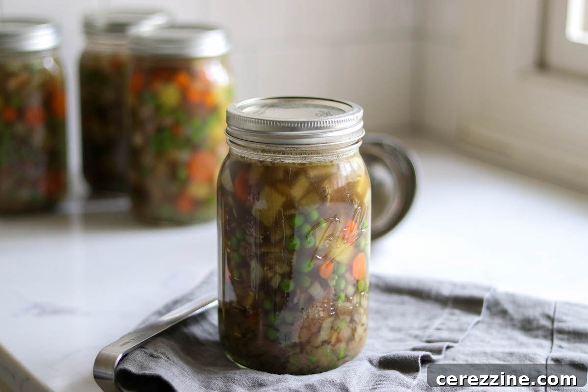 Canning Beef Pot Pie Filling in glass jars