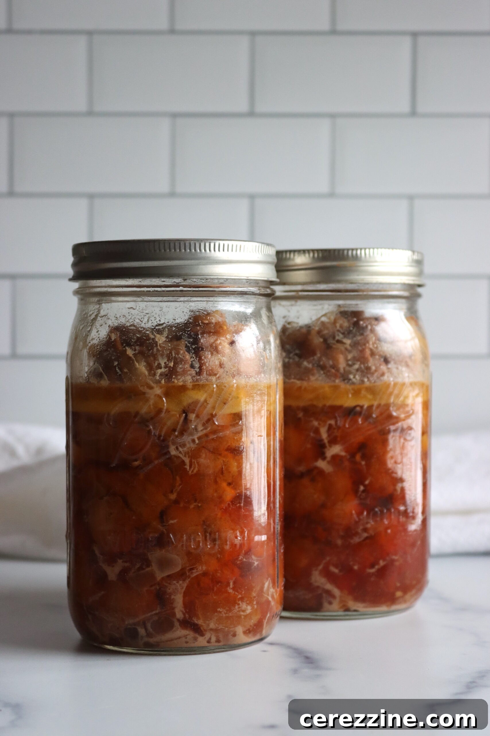 Homemade Canned Chicken Taco Meat 4 Raw chicken thighs seasoned and ready to be packed into canning jars for pressure canning.
