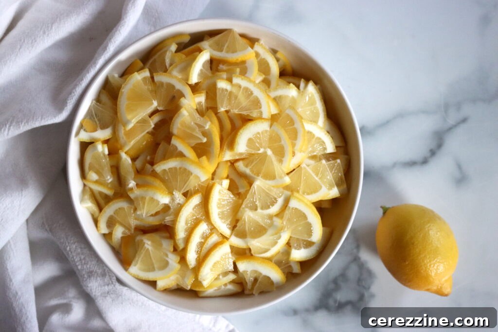 Thinly sliced lemons for marmalade preparation