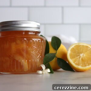 Traditional Lemon Marmalade in a jar with a spoon