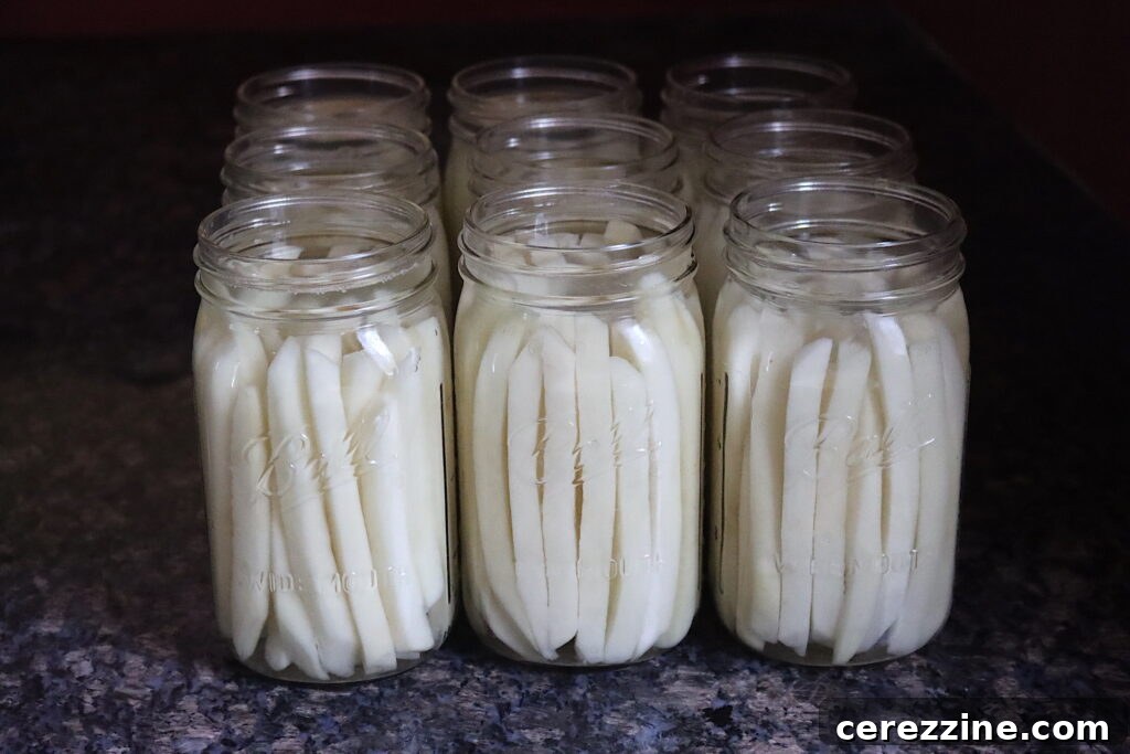 French fries packed in jars with boiling water