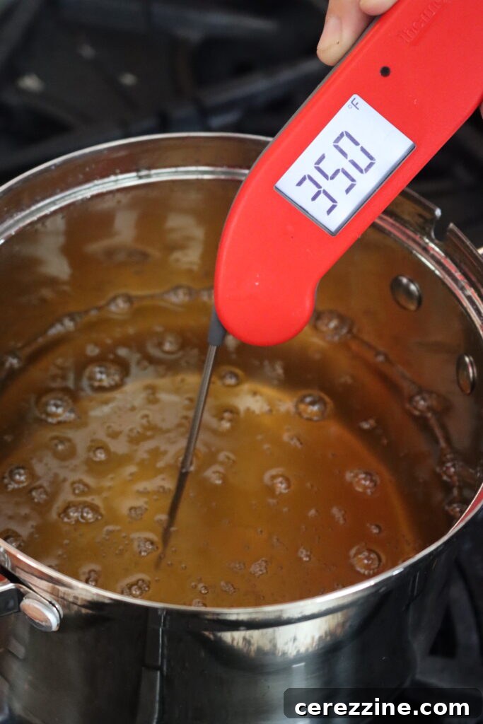 French fries frying in a pot of oil