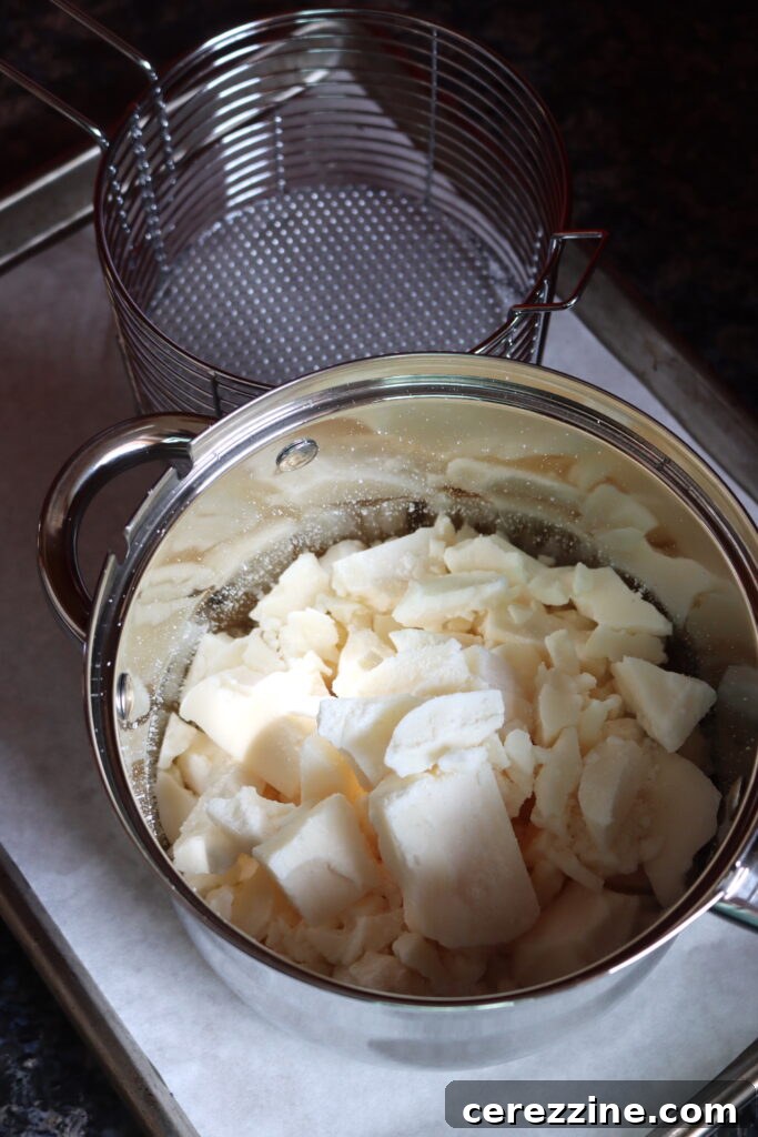 French fries frying in tallow