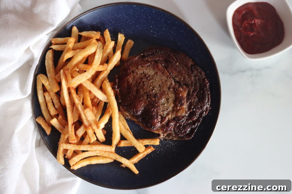 Steak and fries with home canned fries, fried in tallow and some homemade ketchup on the side.
