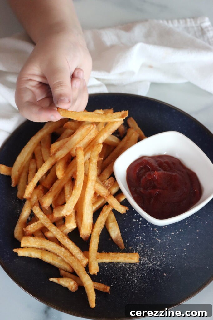 A jar of pressure canned French fries ready to be opened