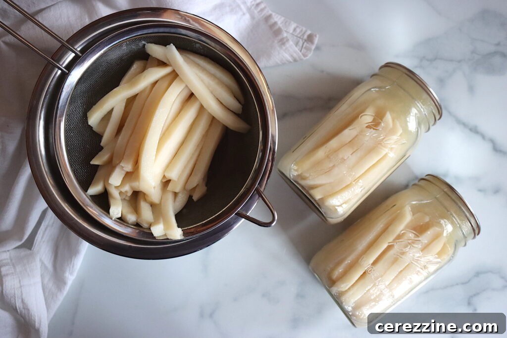 Raw French fries in jars ready for the pressure canner