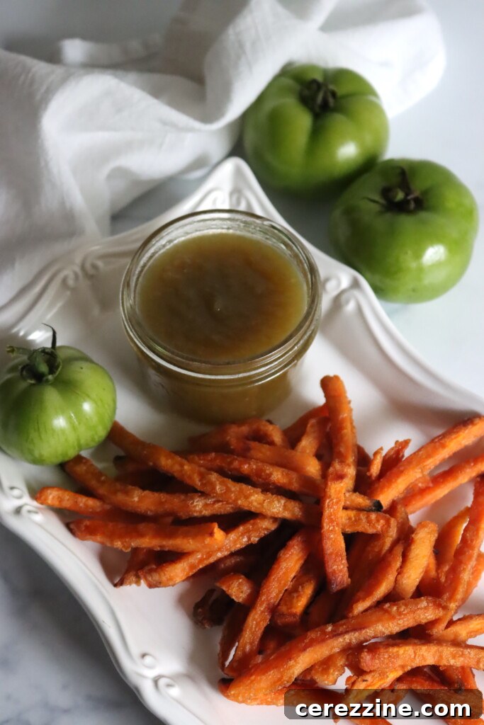 Zesty Green Tomato Ketchup 9 Homemade green tomato ketchup served alongside crispy sweet potato fries.