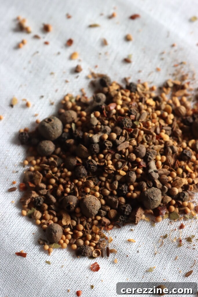 Craft Your Own Pickling Spice 3 Close-up of various whole spices including cinnamon sticks, bay leaves, and mustard seeds