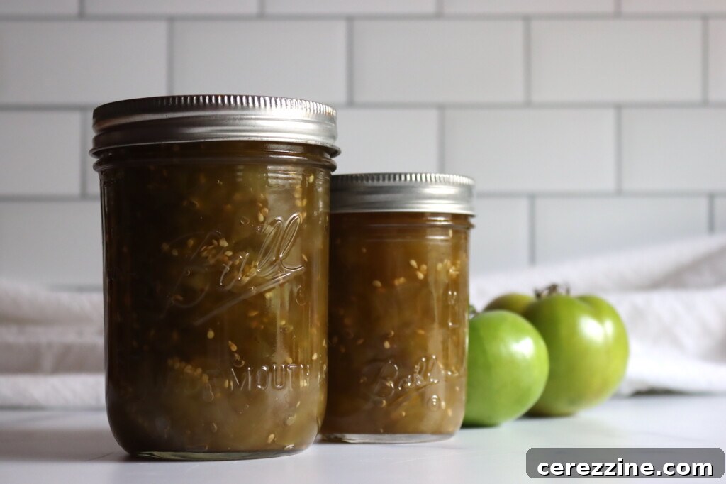 A perfectly sealed jar of homemade Green Tomato Chow Chow, glistening and ready for storage, showcasing the beauty of home canning.