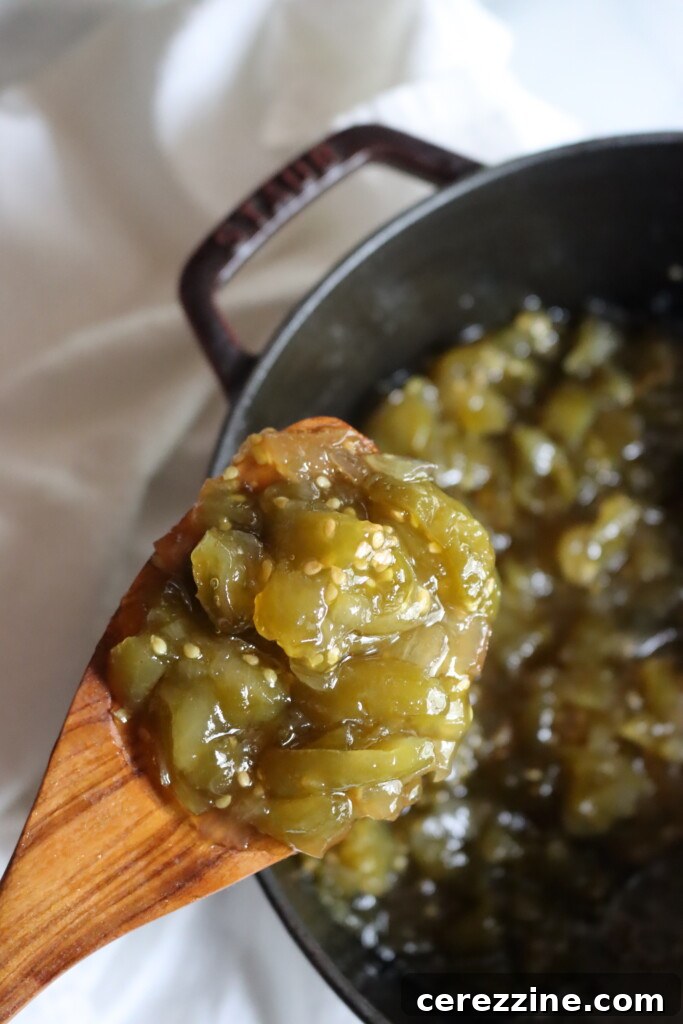 Finished green tomato chow chow on a spoon.
