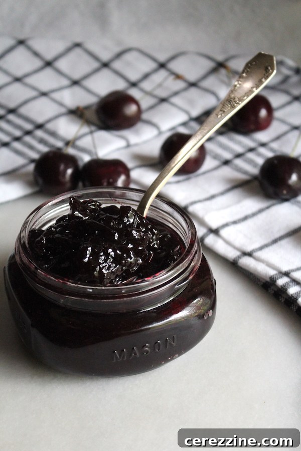 Jars of freshly made black cherry jam