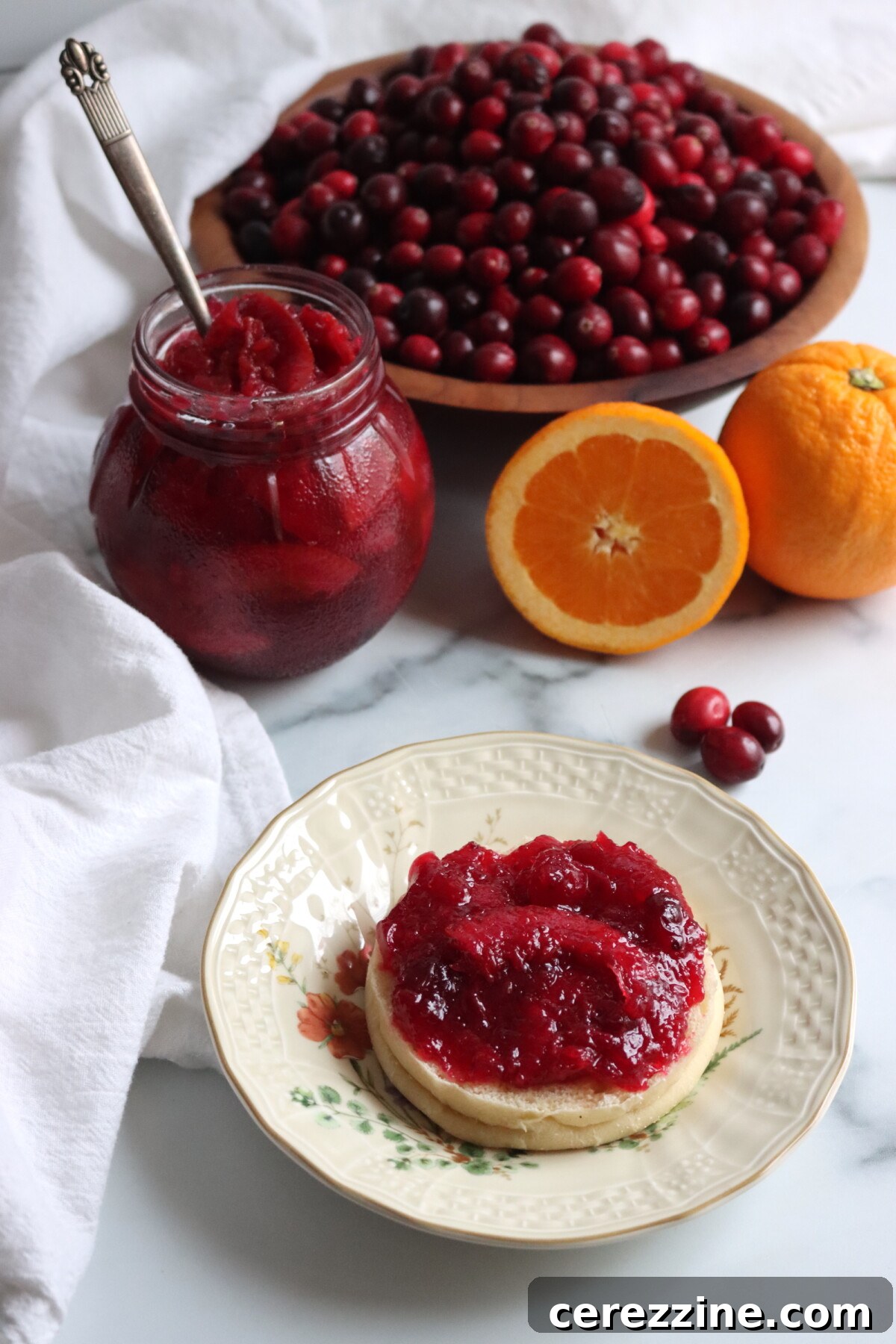 Close-up of vibrant Cranberry Orange Marmalade simmering in a pot