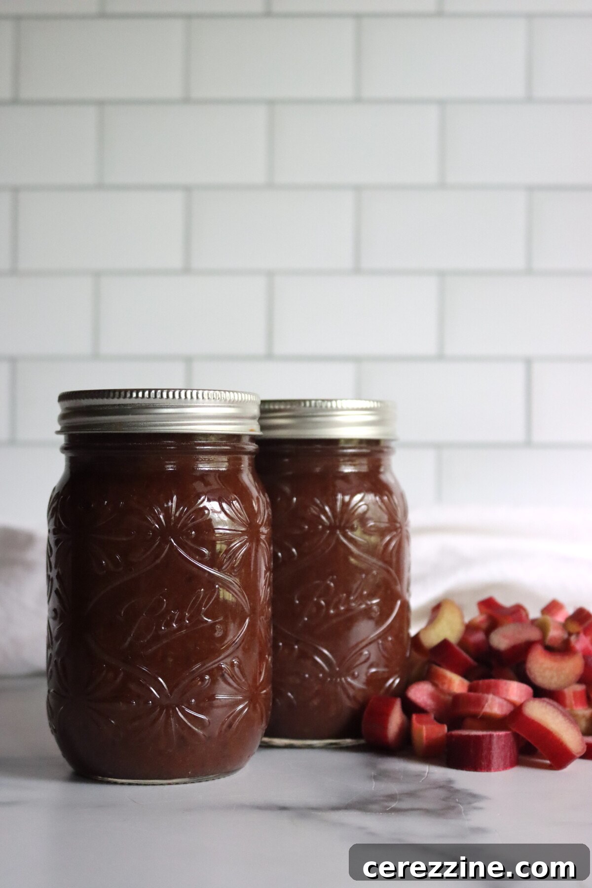 Rhubarb BBQ Sauce in jars ready for canning