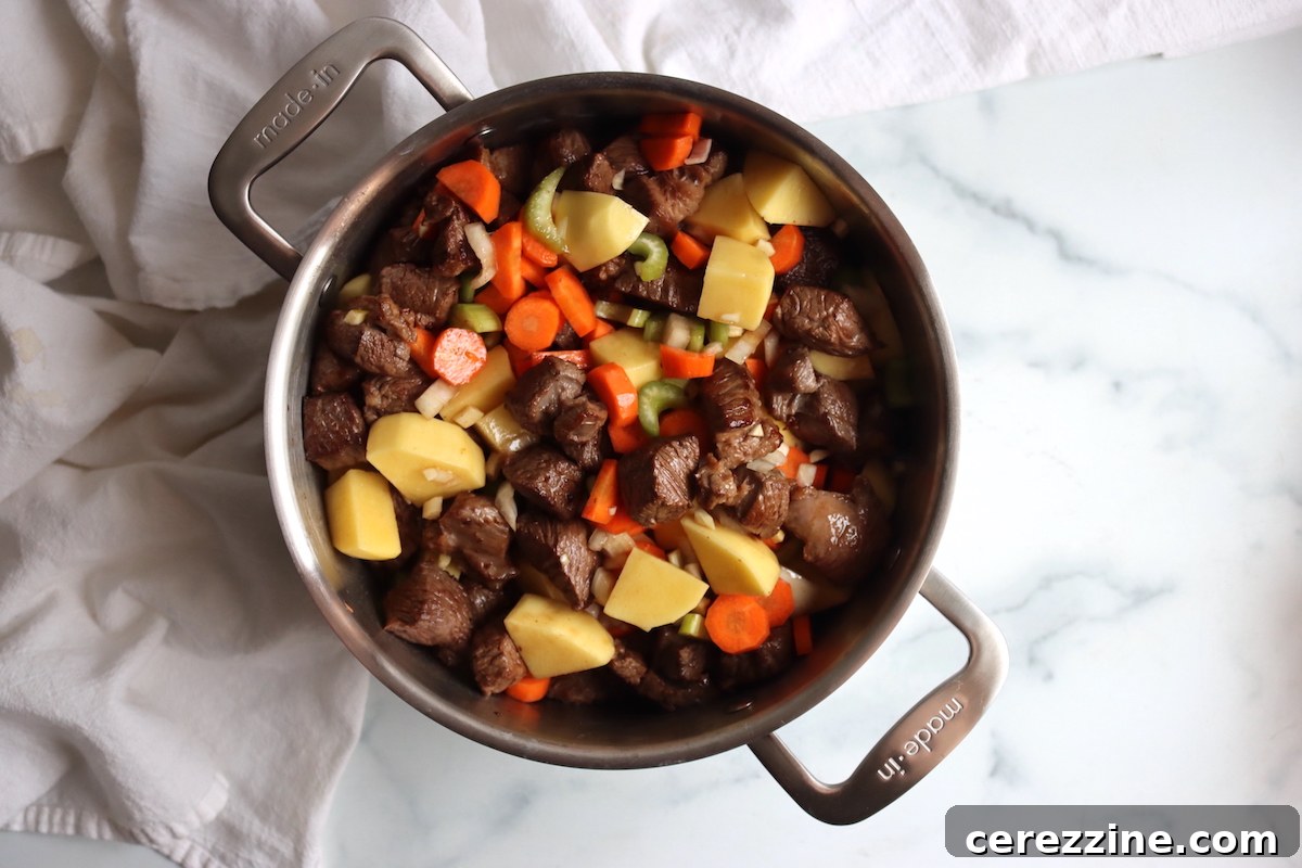 Combining ingredients for Canning Beef Stew