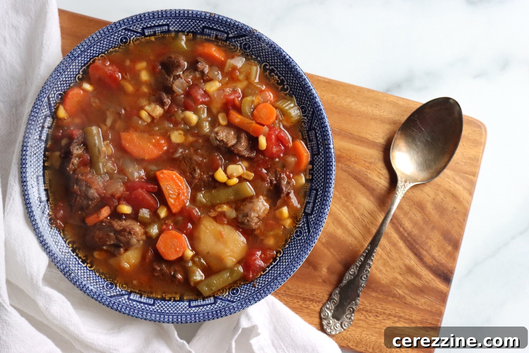 Sealed jars of beef and vegetable soup after canning