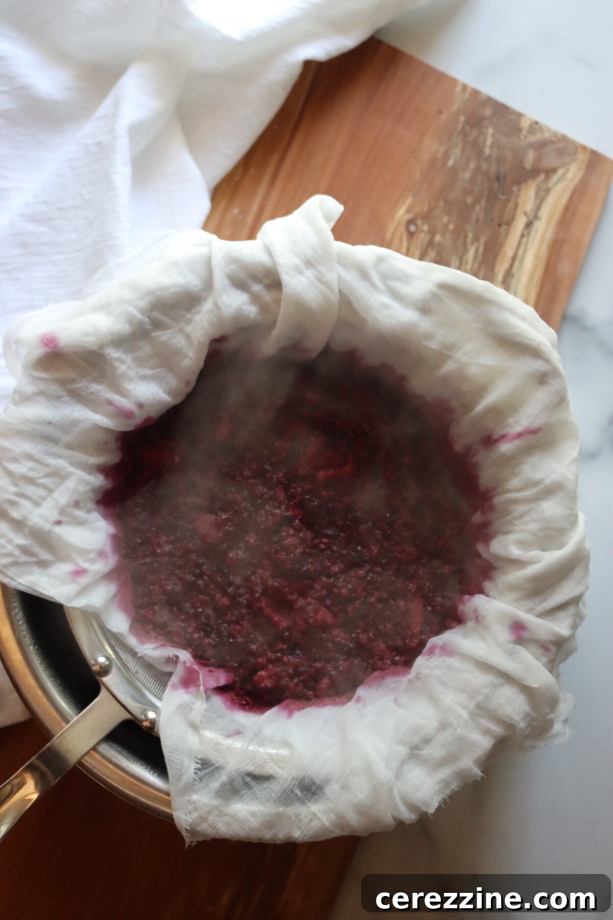 Shimmering Blackberry Essence 6 Straining Blackberries for Jelly Juice