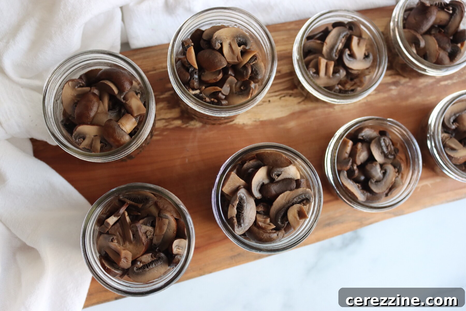 Preserving Mushroom Perfection 10 Filling Jars for canning mushrooms