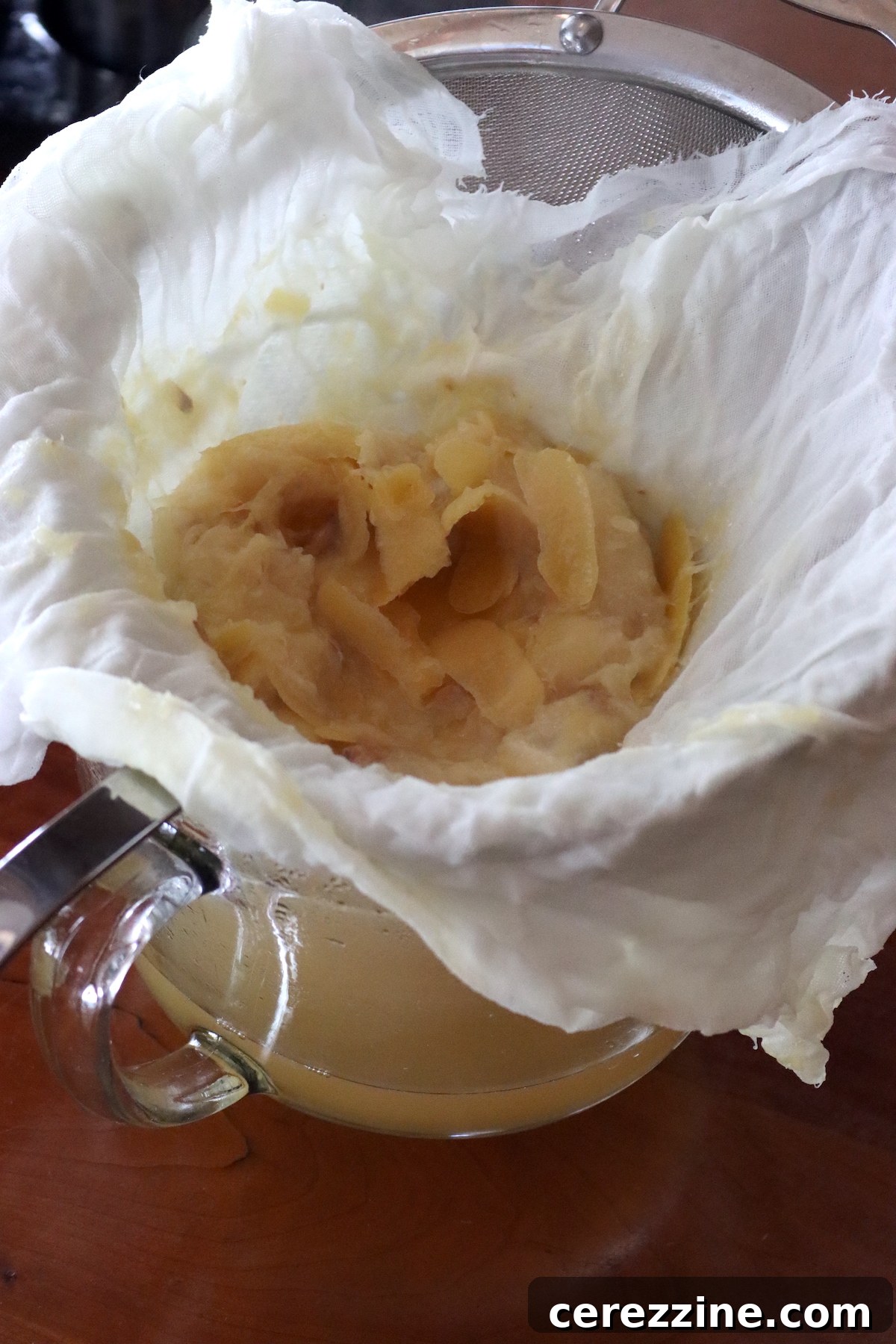 Lemony Gel 10 Straining lemon juice for jelly