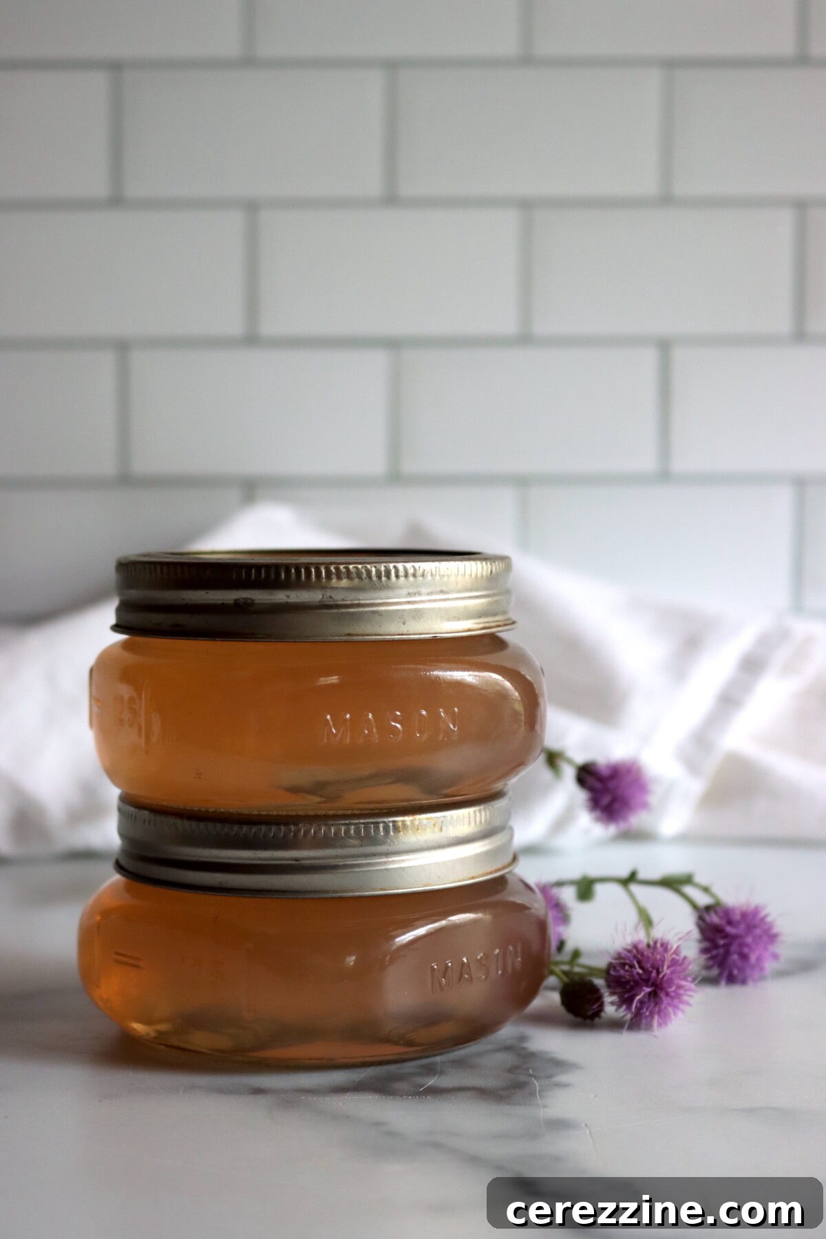 Nectar of the Thorn 9 Sealed jars of thistle jelly on a kitchen counter