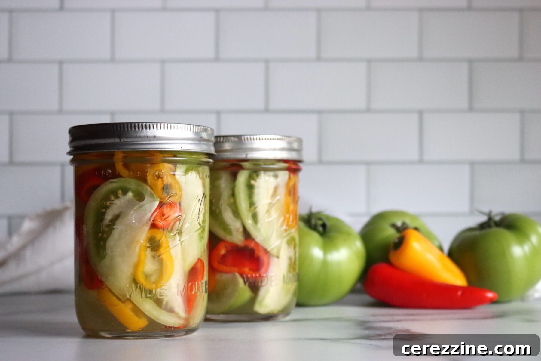 Spicy Pickled Green Tomatoes and hot peppers