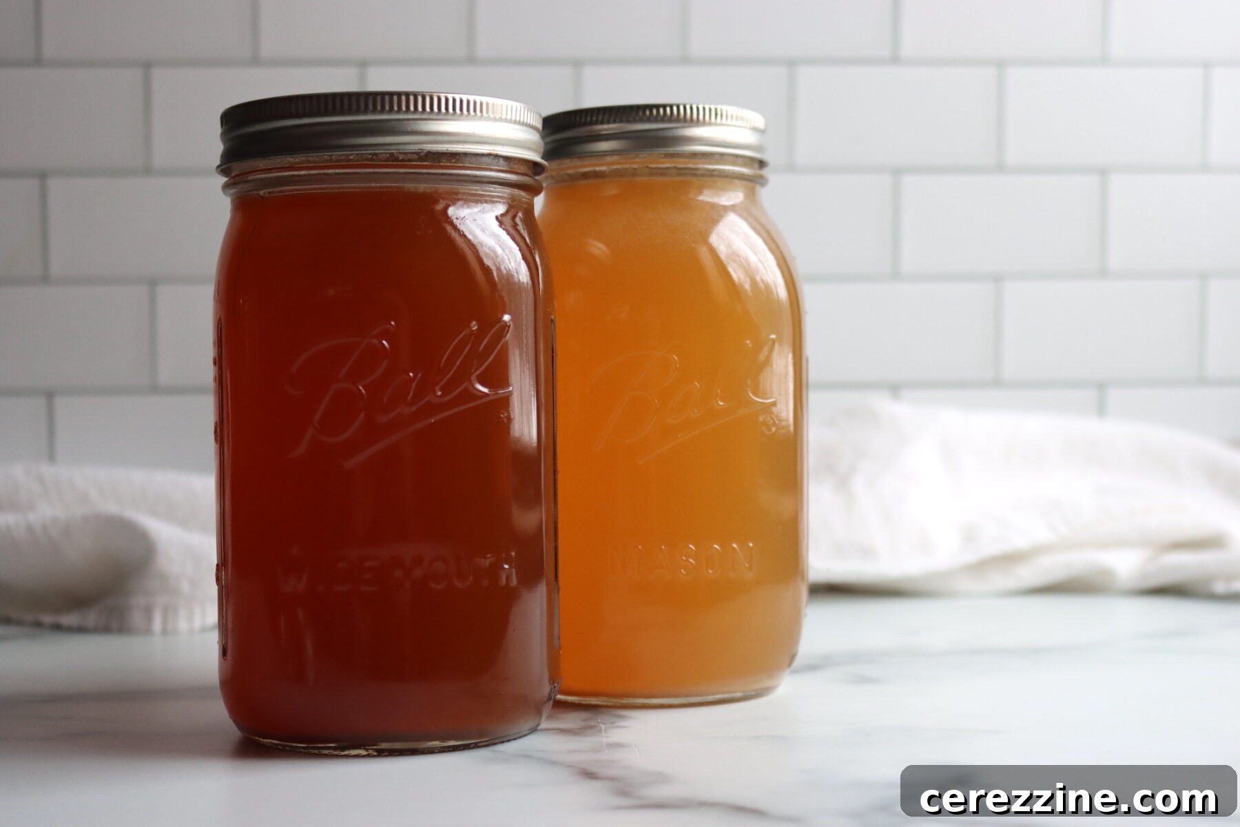 12+ Broth and Stock Recipes for Home Canning 2 Venison Broth (front) and Turkey Broth (rear)