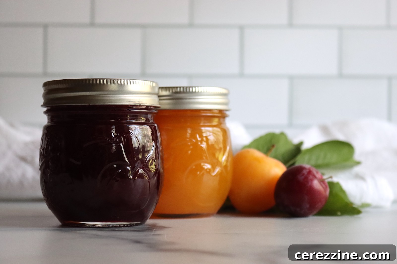 Jars of yellow plum jam